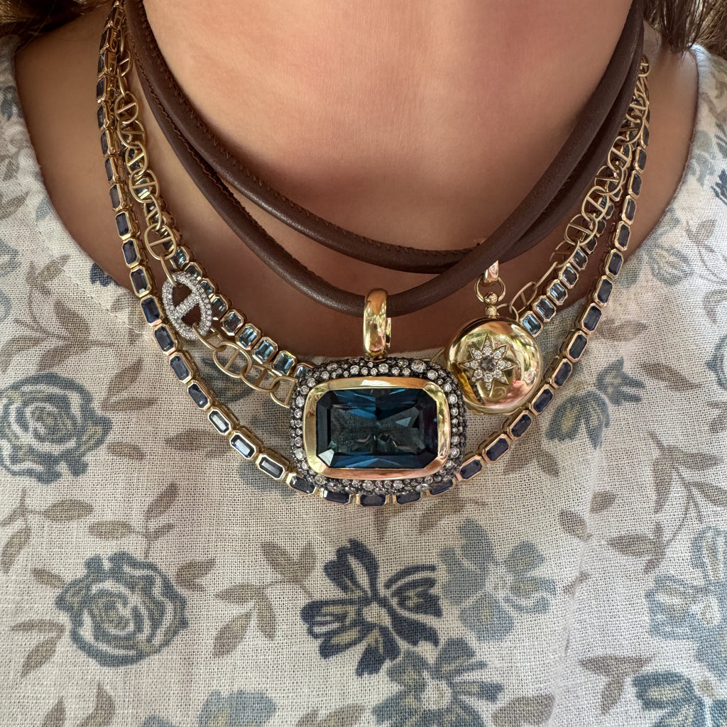 East West Emerald Cut Blue Sapphire Bezel Tennis Necklace